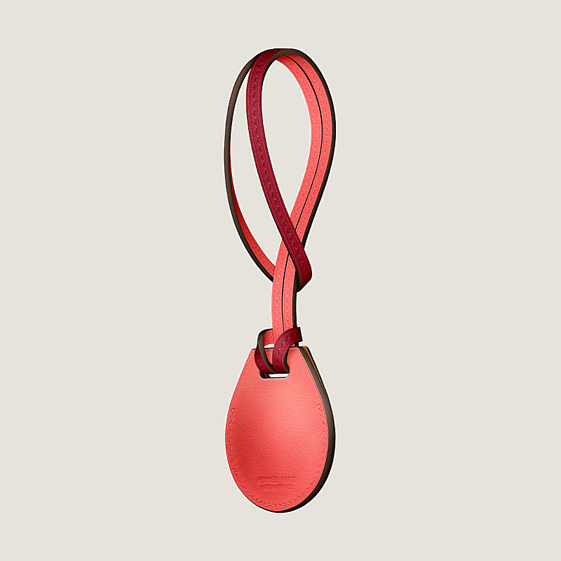 Apple AirTag Hermès bicolor bag charm | Hermès UK Apple AirTag Hermès bicolor bag charm | Hermès UK